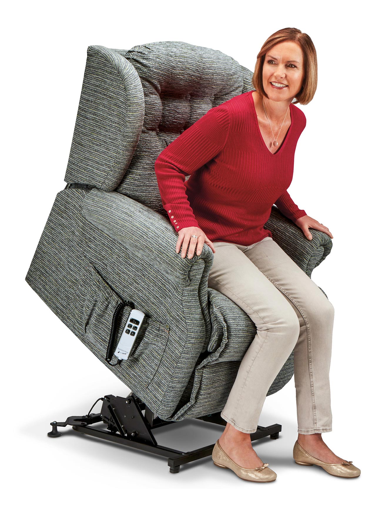 1602_Small_Lynton_Riser_Tusc_Flint_F Lady in red top sitting in grey mobility armchair