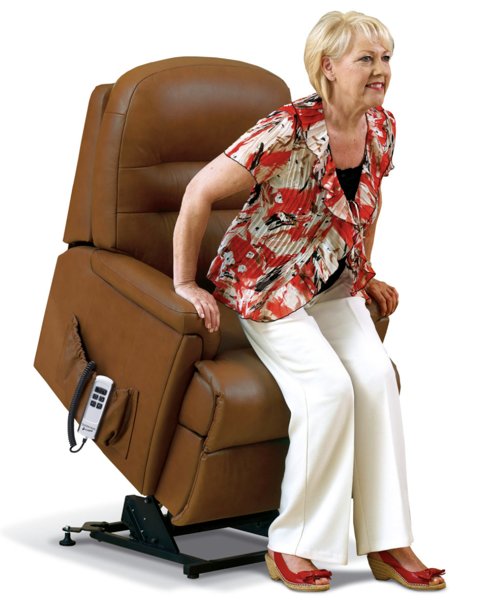 Screenshot 2023-03-05 at 13.38.56 Lady getting out of rising mobility chair in brown leather with remote control